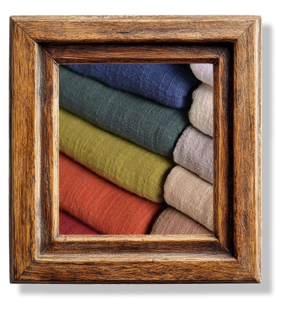 A close up of different solid colored fabrics in a wooden frame.